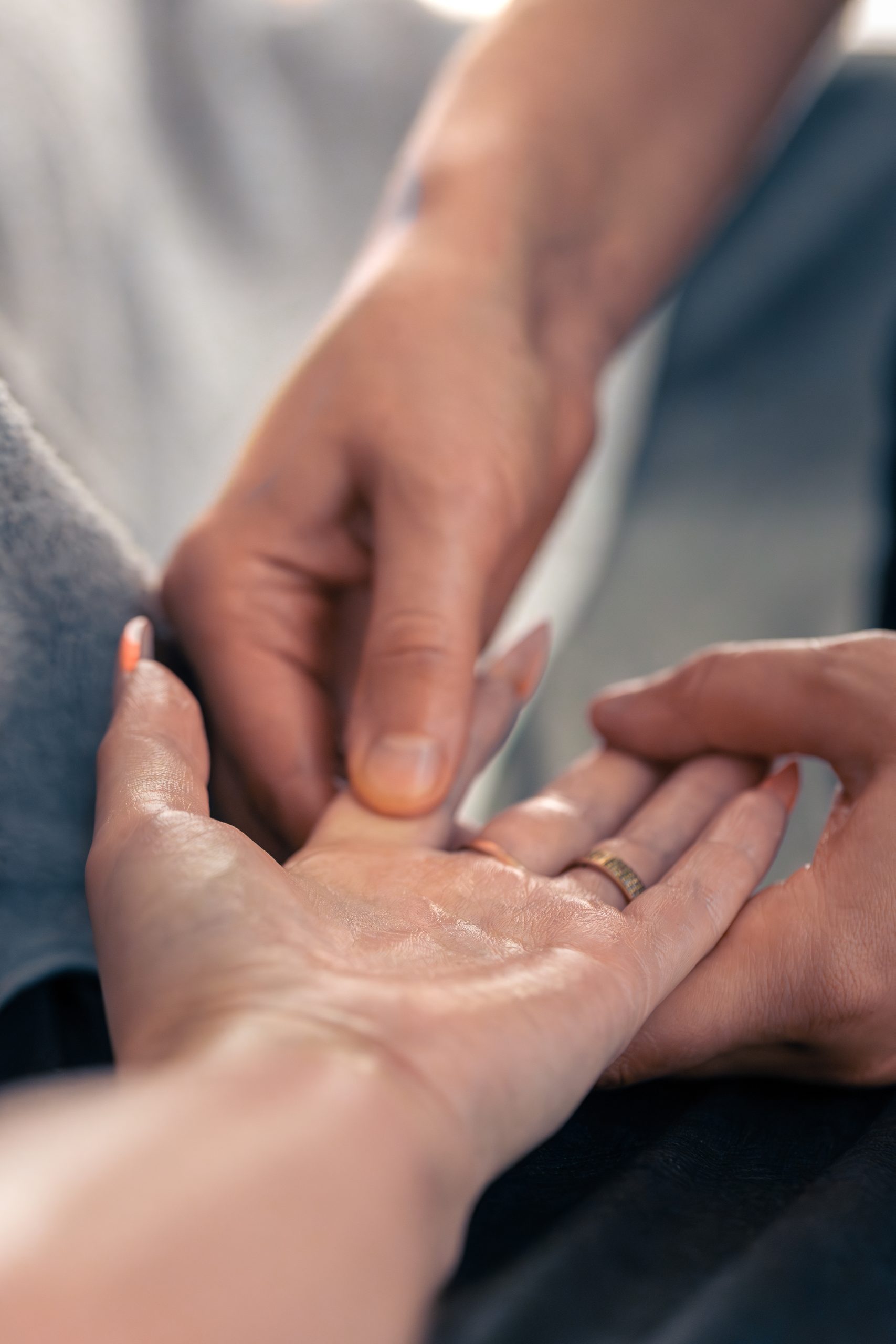 central palm pressure in spa studio. soft focus on the wrist